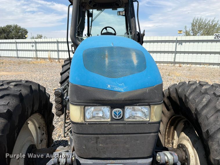 image for item YA4187 1999 New Holland TV140 MFWD bi-directional tractor
