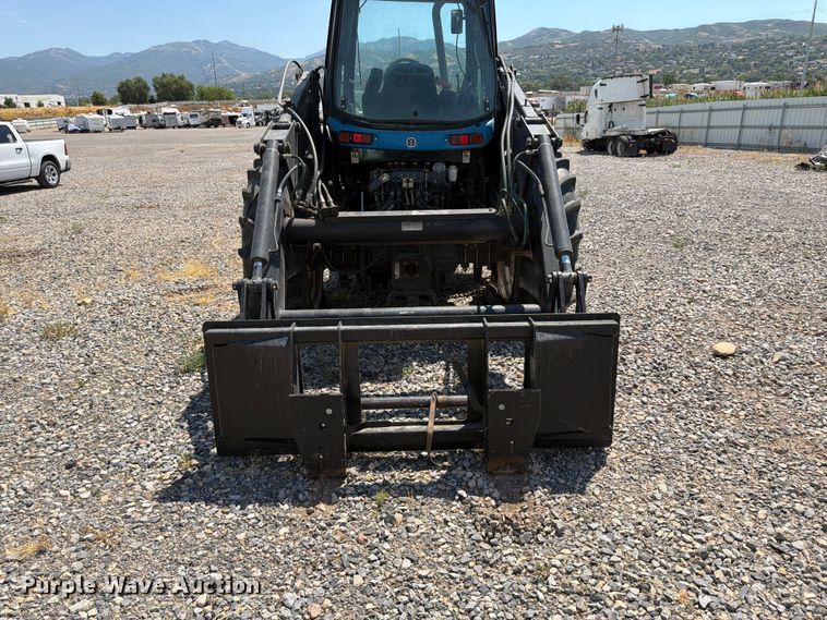 image for item YA4187 1999 New Holland TV140 MFWD bi-directional tractor