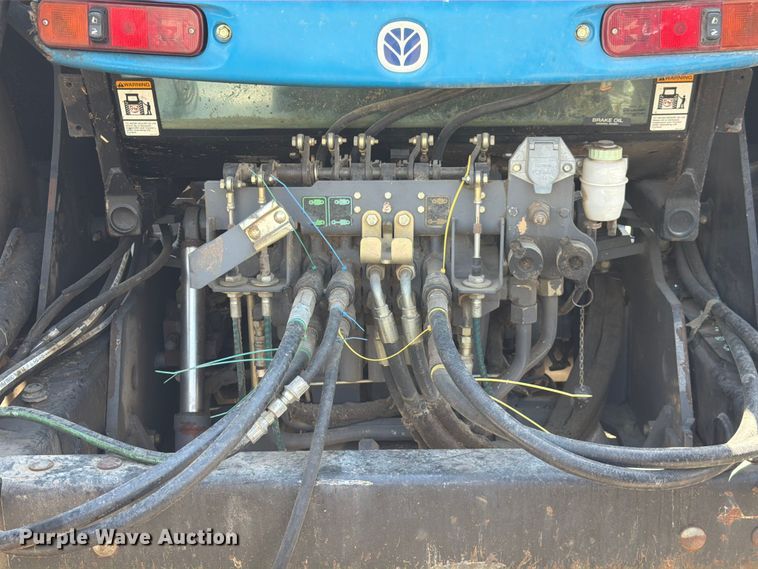 image for item YA4187 1999 New Holland TV140 MFWD bi-directional tractor