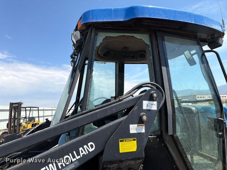 image for item YA4187 1999 New Holland TV140 MFWD bi-directional tractor