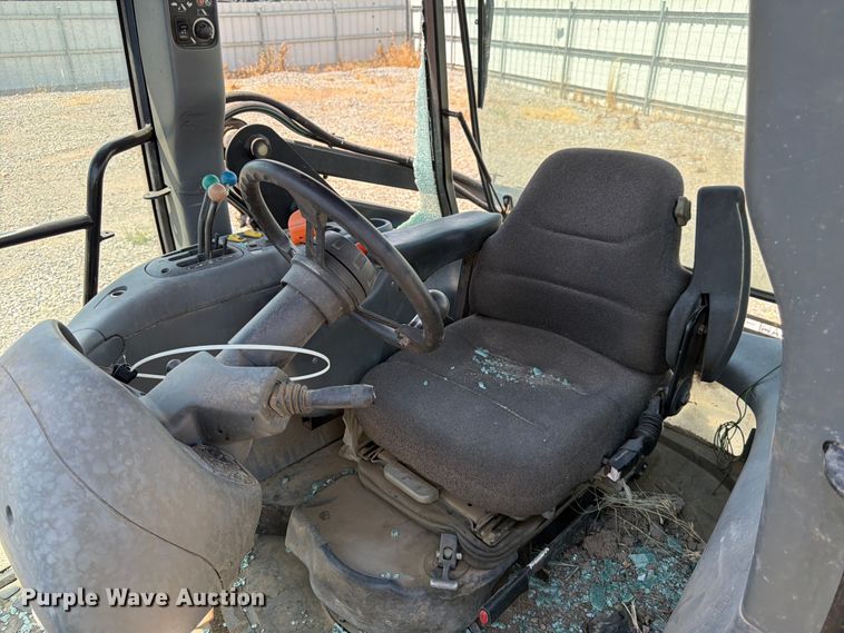 image for item YA4187 1999 New Holland TV140 MFWD bi-directional tractor