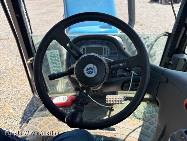 image for item YA4187 1999 New Holland TV140 MFWD bi-directional tractor