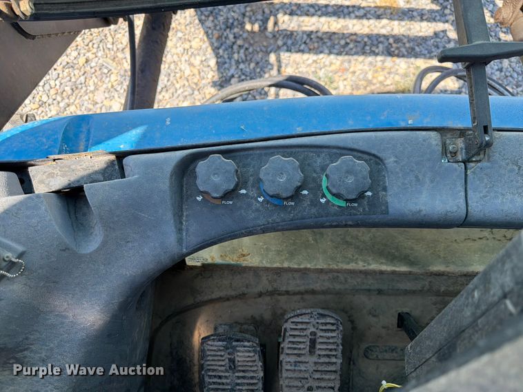 image for item YA4187 1999 New Holland TV140 MFWD bi-directional tractor