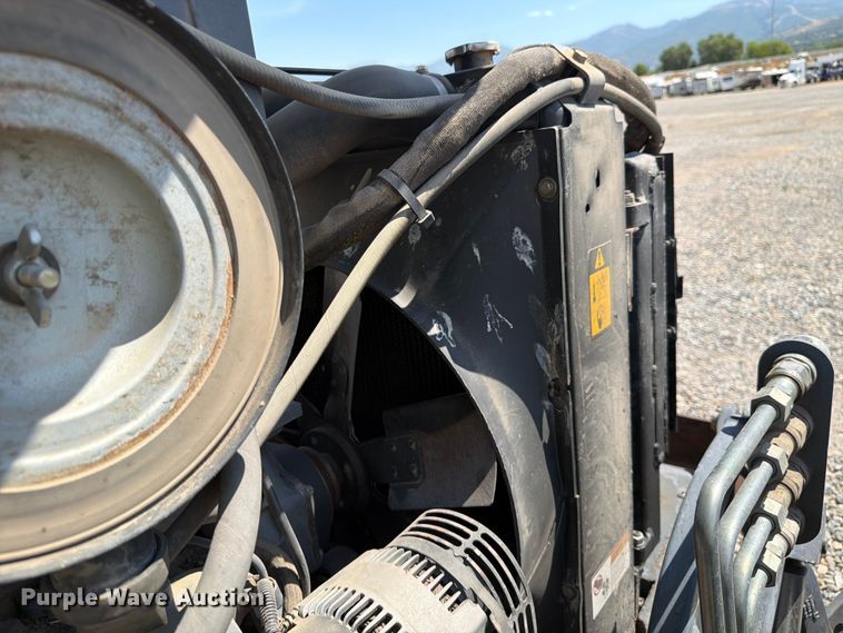 image for item YA4187 1999 New Holland TV140 MFWD bi-directional tractor