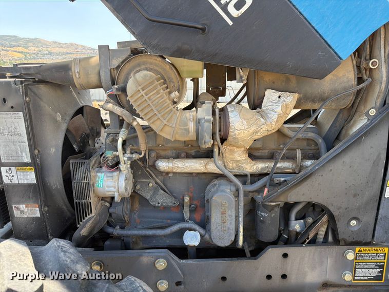 image for item YA4187 1999 New Holland TV140 MFWD bi-directional tractor