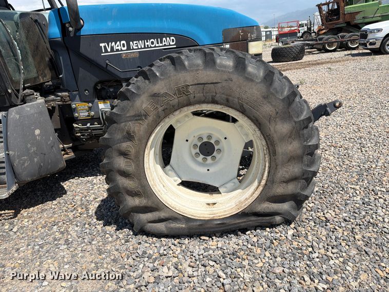image for item YA4187 1999 New Holland TV140 MFWD bi-directional tractor