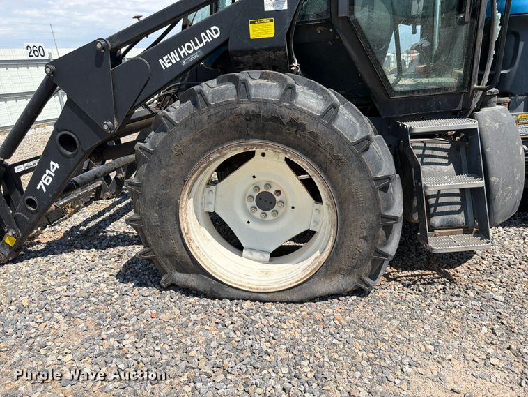 image for item YA4187 1999 New Holland TV140 MFWD bi-directional tractor