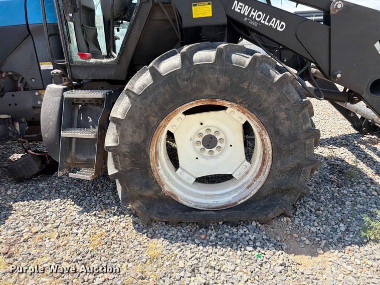 image for item YA4187 1999 New Holland TV140 MFWD bi-directional tractor