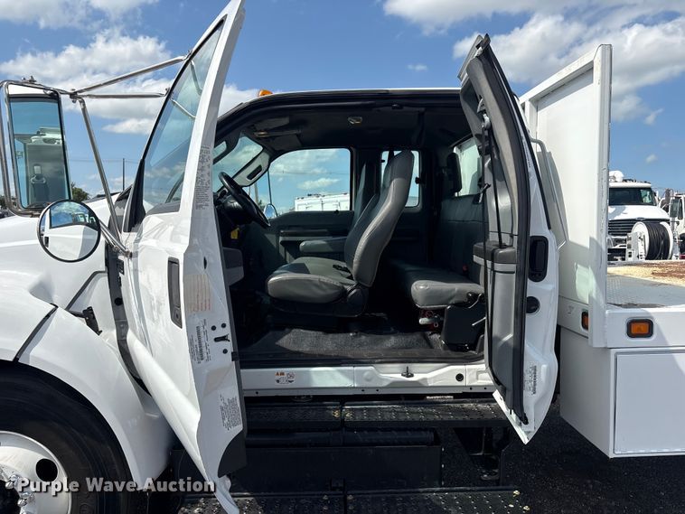 image for item EG9182 2015 Ford F650 Super Duty Ext. Cab flatbed truck