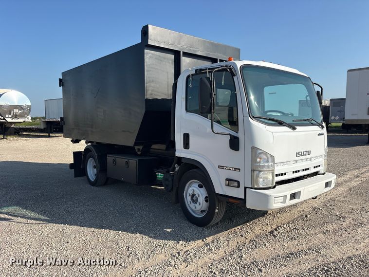 image for item ET0333 2014 Isuzu NPR roll-off container truck