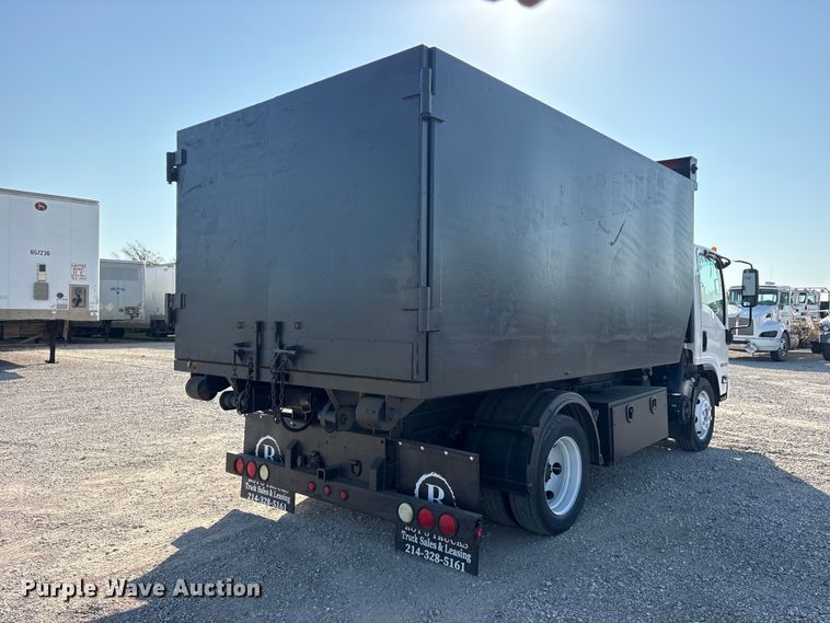 image for item ET0333 2014 Isuzu NPR roll-off container truck