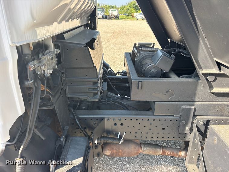 image for item ET0333 2014 Isuzu NPR roll-off container truck