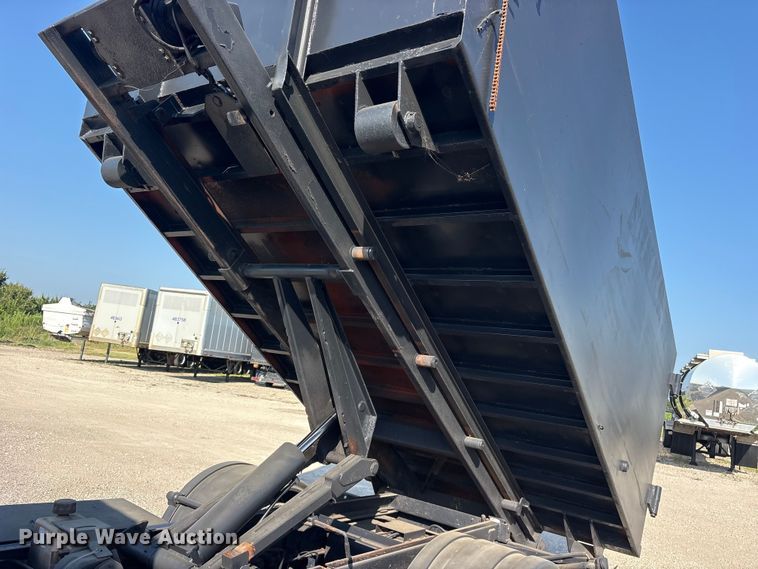 image for item ET0333 2014 Isuzu NPR roll-off container truck