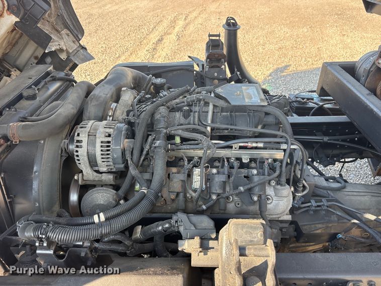 image for item ET0333 2014 Isuzu NPR roll-off container truck