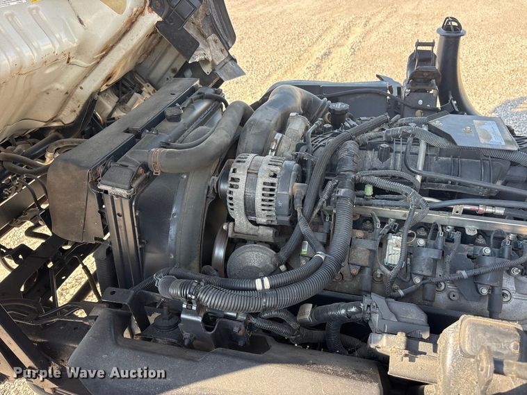 image for item ET0333 2014 Isuzu NPR roll-off container truck