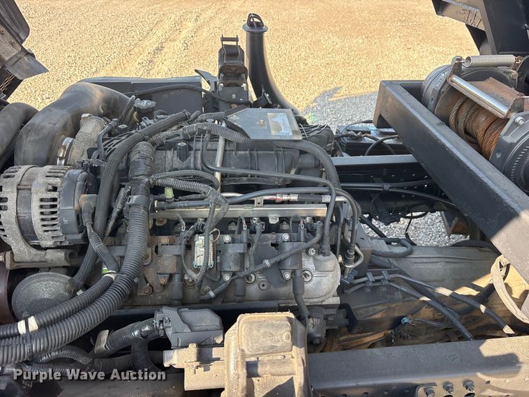image for item ET0333 2014 Isuzu NPR roll-off container truck