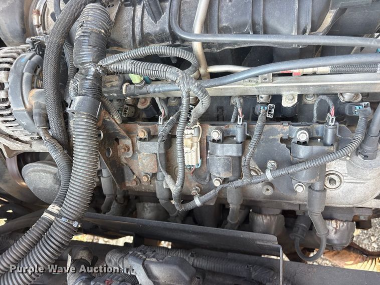image for item ET0333 2014 Isuzu NPR roll-off container truck