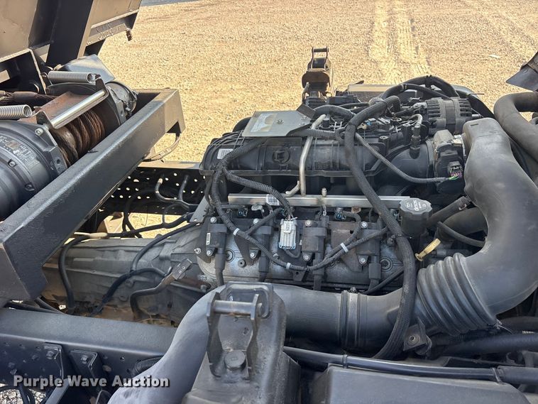 image for item ET0333 2014 Isuzu NPR roll-off container truck