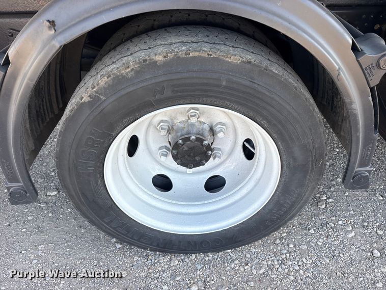 image for item ET0333 2014 Isuzu NPR roll-off container truck