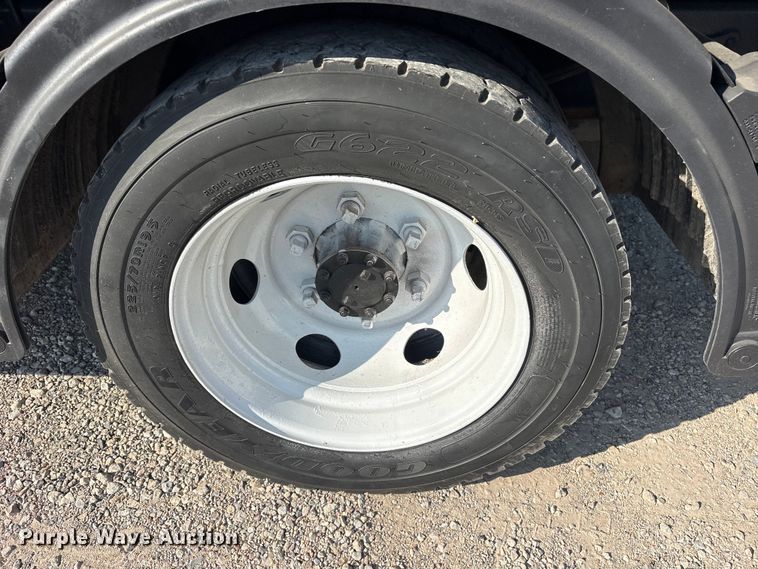 image for item ET0333 2014 Isuzu NPR roll-off container truck