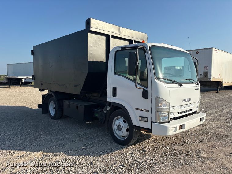 image for item ET0334 2016 Isuzu NPR roll-off container truck