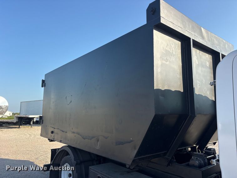 image for item ET0334 2016 Isuzu NPR roll-off container truck