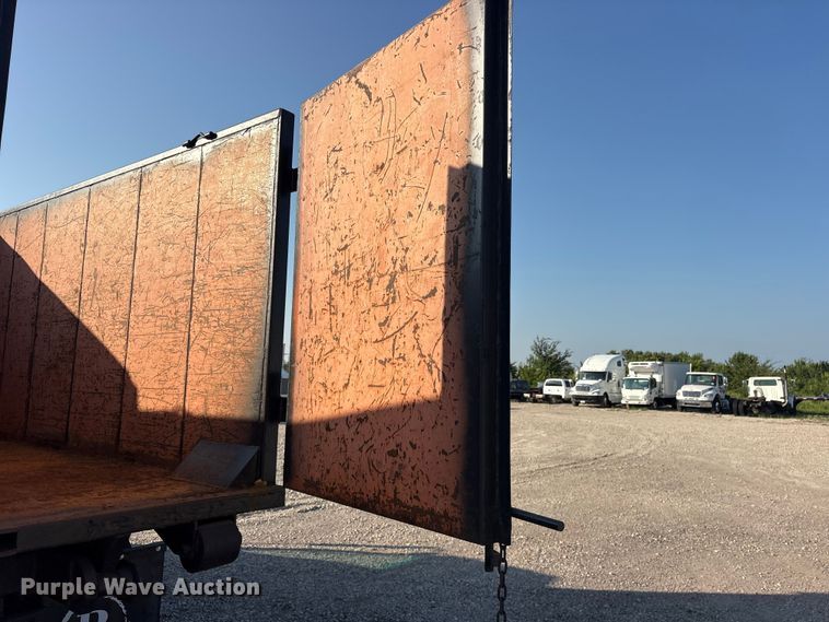 image for item ET0334 2016 Isuzu NPR roll-off container truck