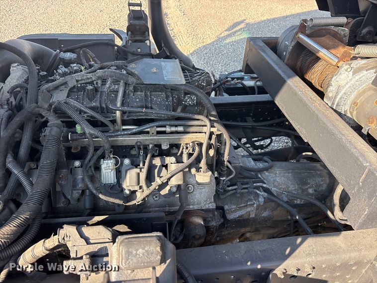 image for item ET0334 2016 Isuzu NPR roll-off container truck