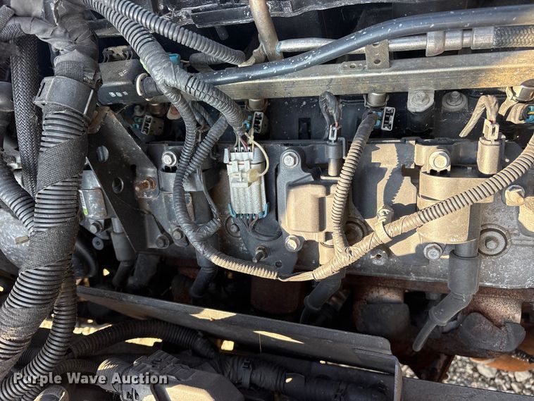 image for item ET0334 2016 Isuzu NPR roll-off container truck