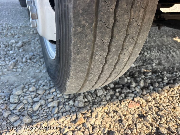 image for item ET0334 2016 Isuzu NPR roll-off container truck