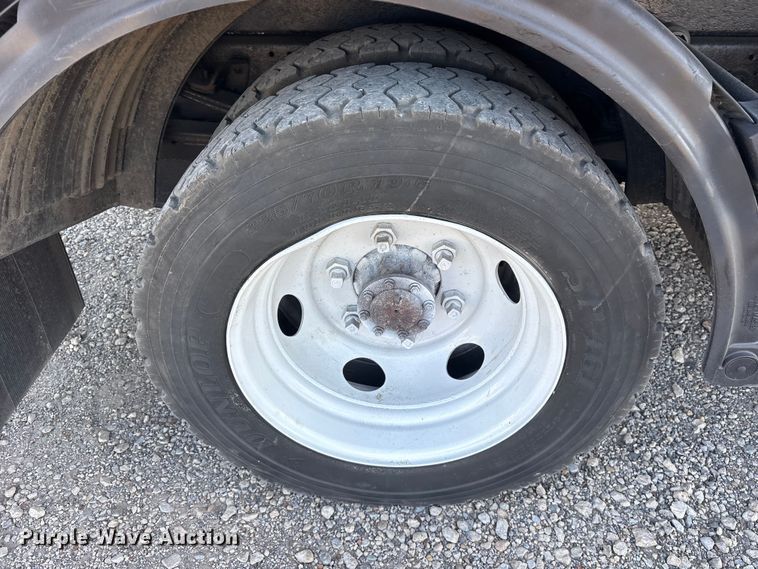 image for item ET0334 2016 Isuzu NPR roll-off container truck