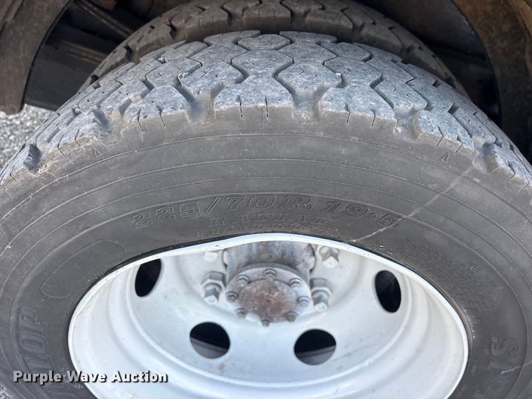 image for item ET0334 2016 Isuzu NPR roll-off container truck
