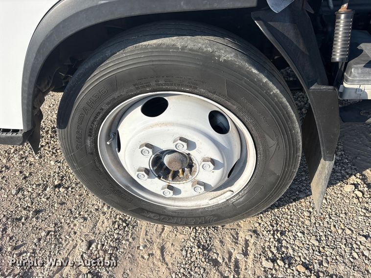 image for item ET0334 2016 Isuzu NPR roll-off container truck