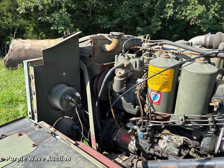 image for item FG0539 1972 AM General M44 flatbed truck