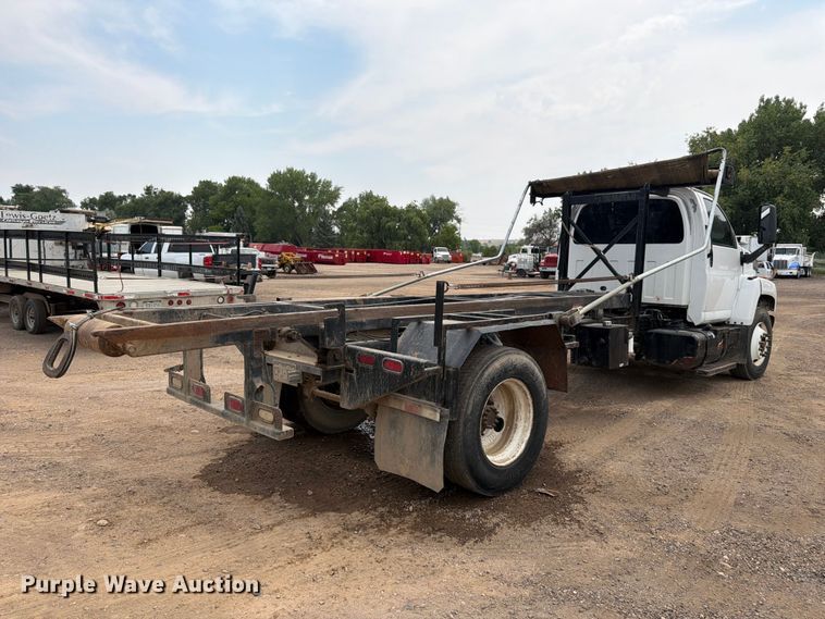 image for item FM7576 2005 GMC C7500 roll-off container truck