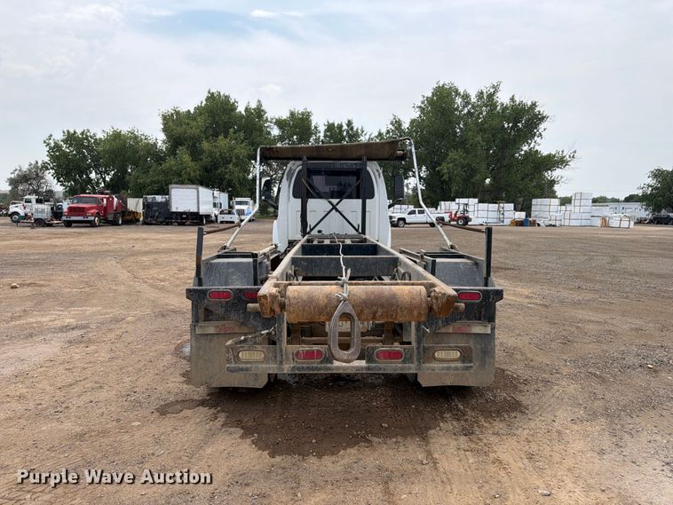 image for item FM7576 2005 GMC C7500 roll-off container truck