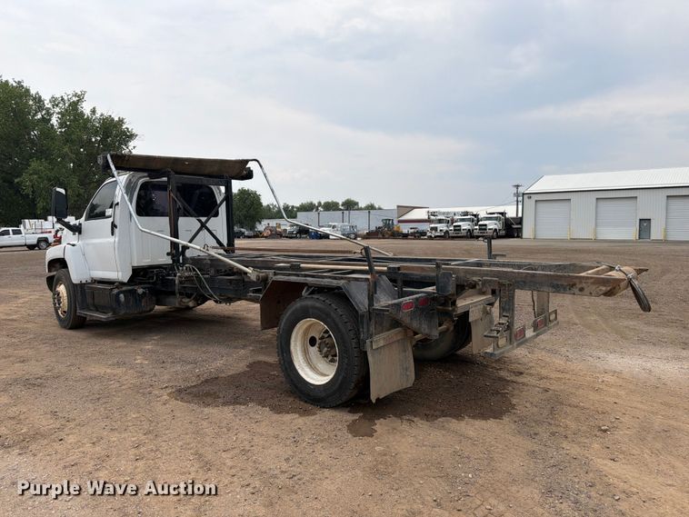 image for item FM7576 2005 GMC C7500 roll-off container truck