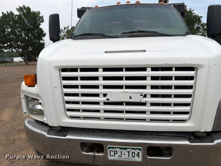 image for item FM7576 2005 GMC C7500 roll-off container truck