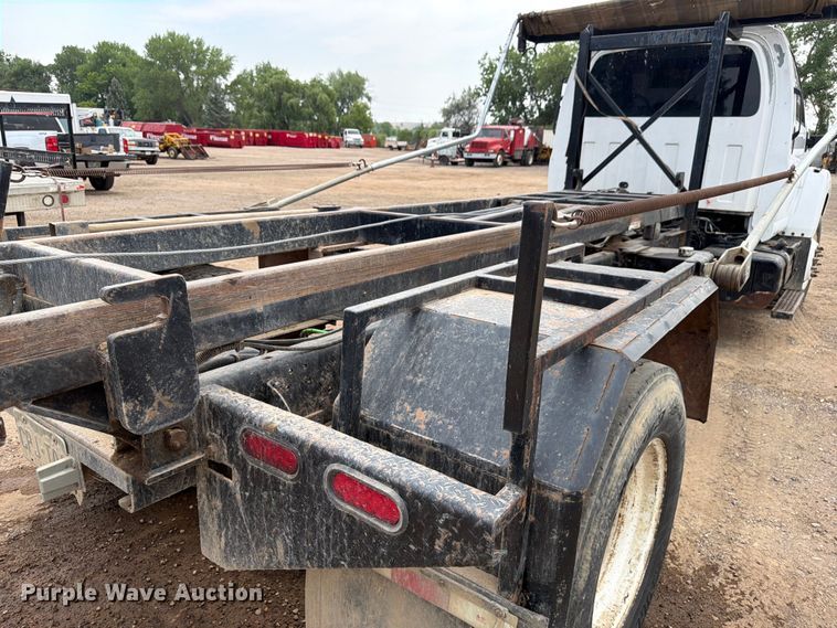 image for item FM7576 2005 GMC C7500 roll-off container truck