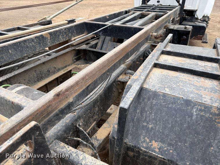image for item FM7576 2005 GMC C7500 roll-off container truck
