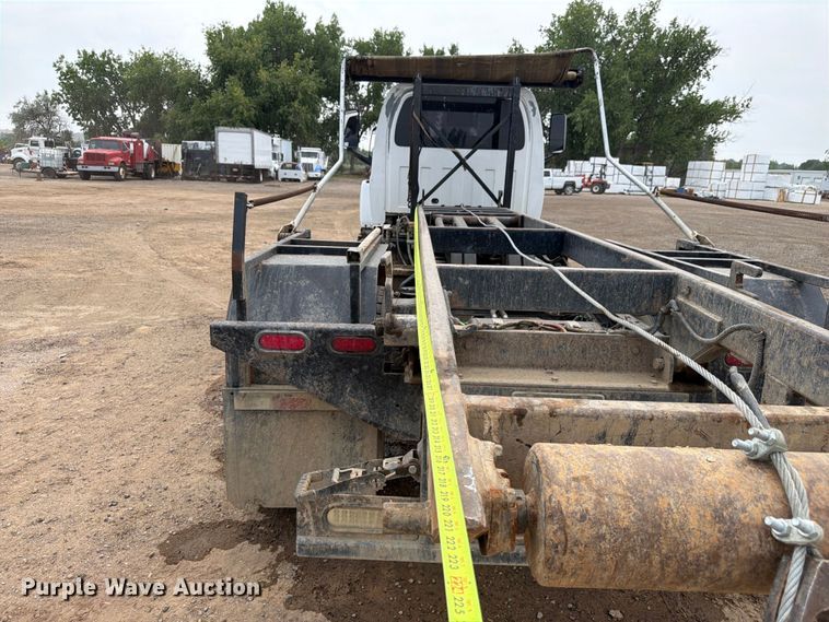 image for item FM7576 2005 GMC C7500 roll-off container truck