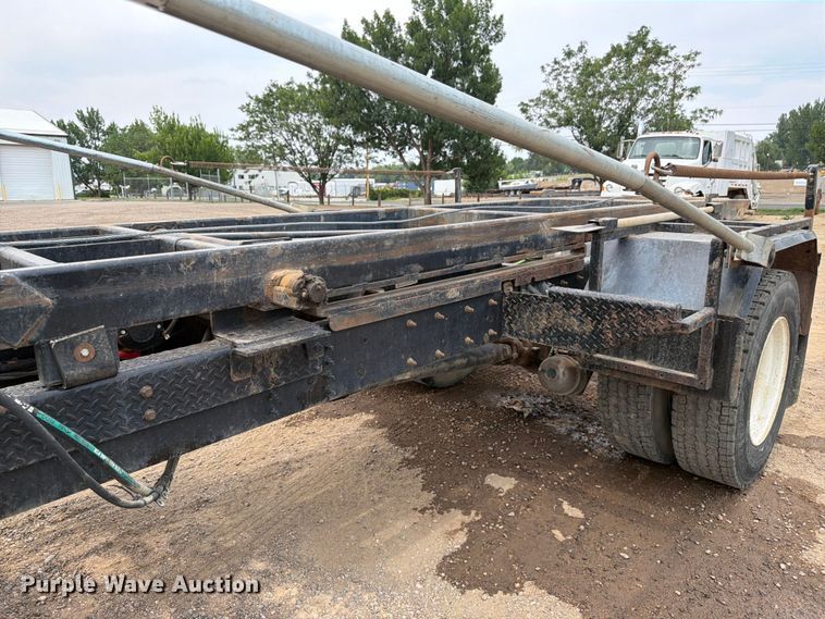 image for item FM7576 2005 GMC C7500 roll-off container truck