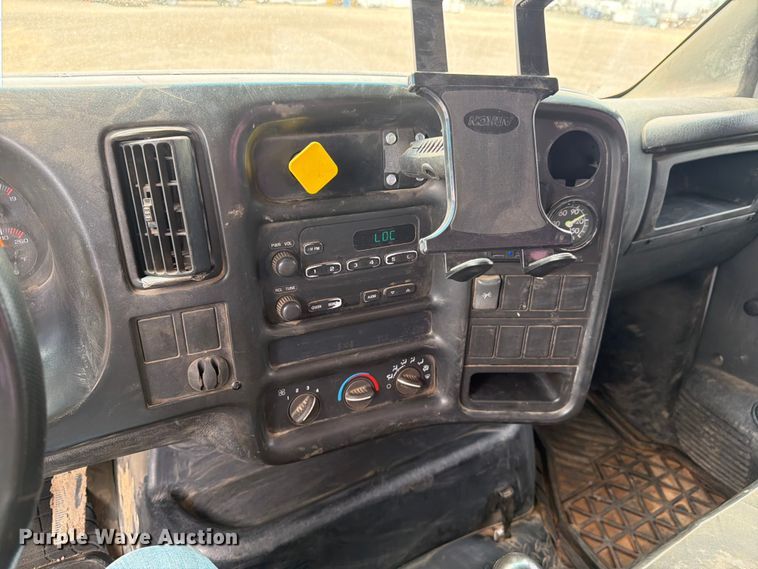 image for item FM7576 2005 GMC C7500 roll-off container truck