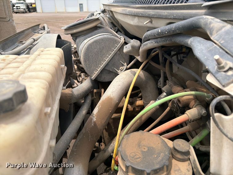 image for item FM7576 2005 GMC C7500 roll-off container truck
