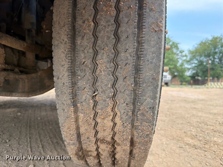 image for item FM7576 2005 GMC C7500 roll-off container truck