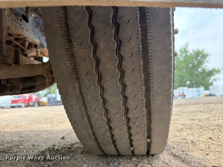 image for item FM7576 2005 GMC C7500 roll-off container truck