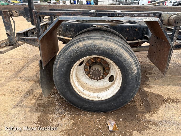 image for item FM7576 2005 GMC C7500 roll-off container truck