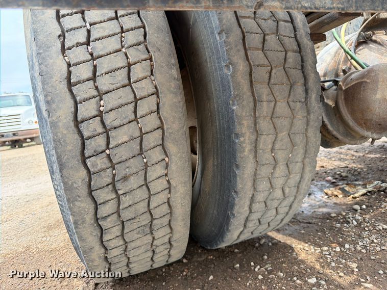 image for item FM7576 2005 GMC C7500 roll-off container truck