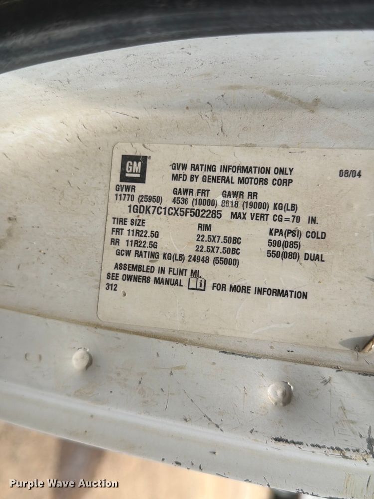 image for item FM7576 2005 GMC C7500 roll-off container truck