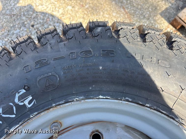 image for item DV7253 (3) 12-16.5 tires and wheels